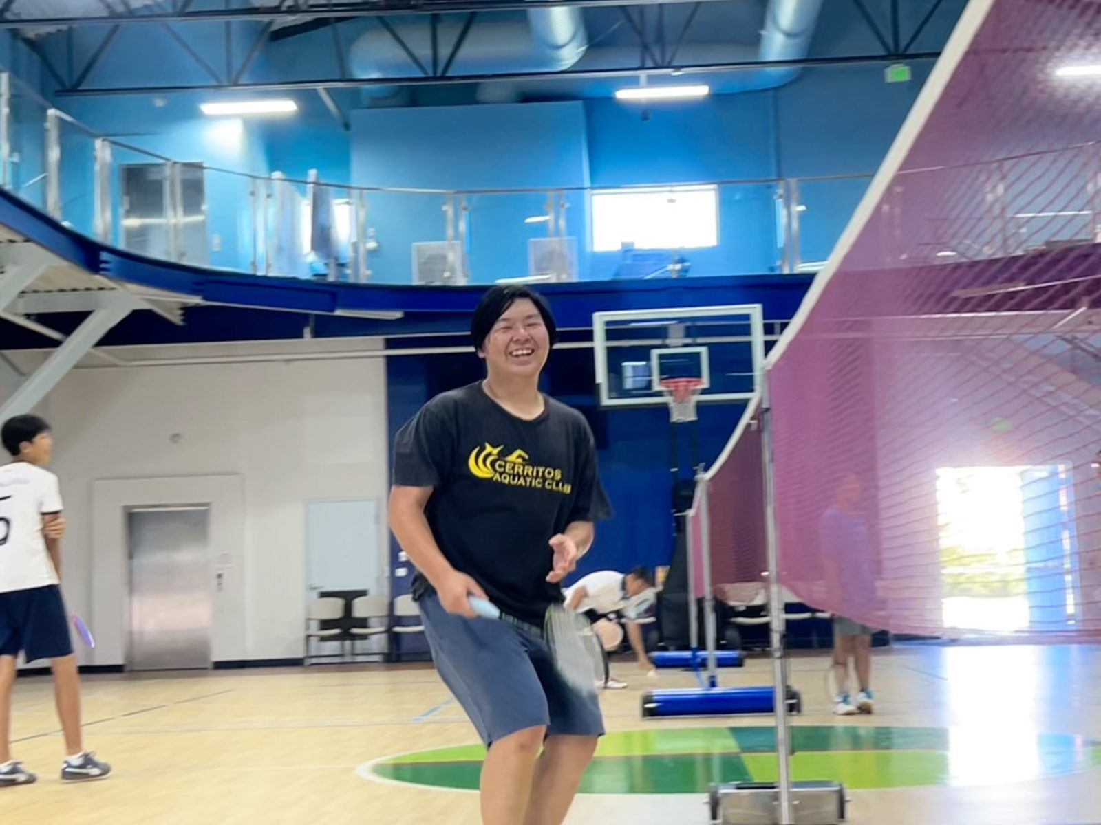 Badminton rally at the gym