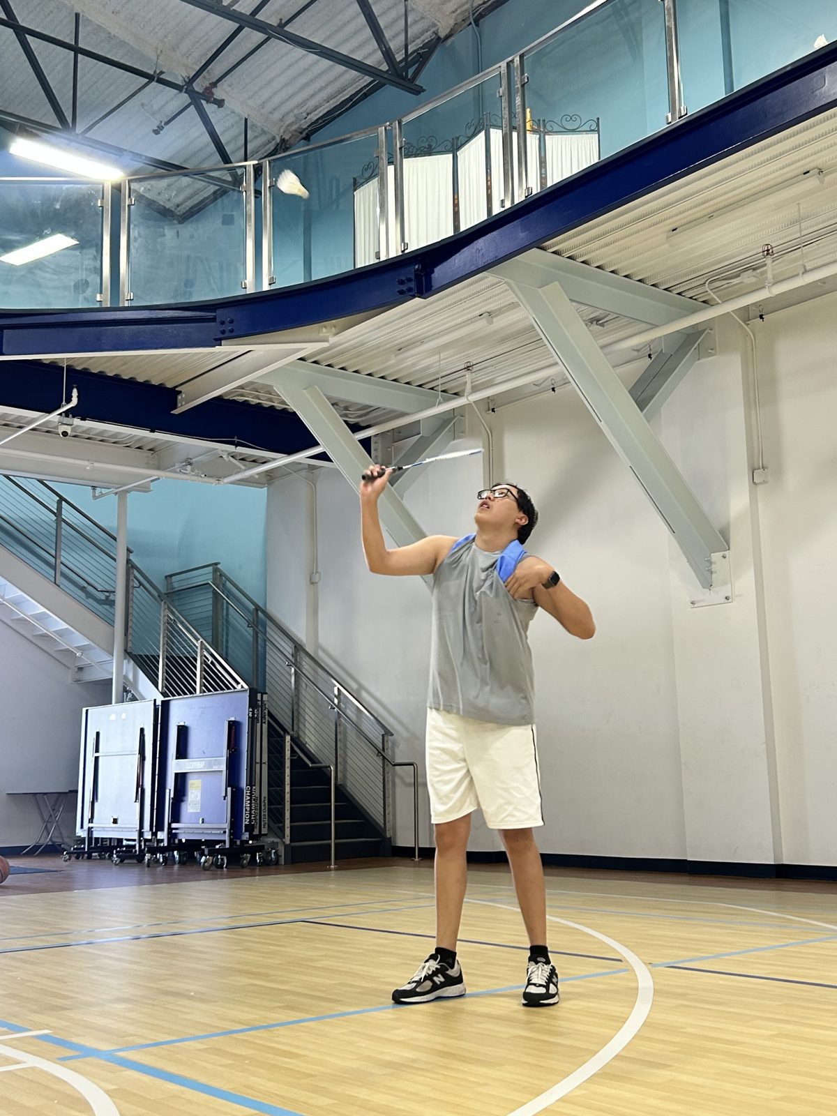 Badminton serve in the gym