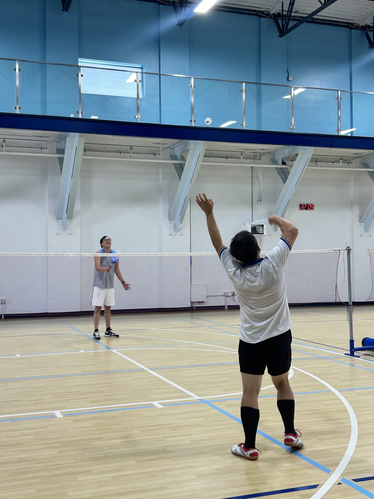 Doubles badminton at the gym