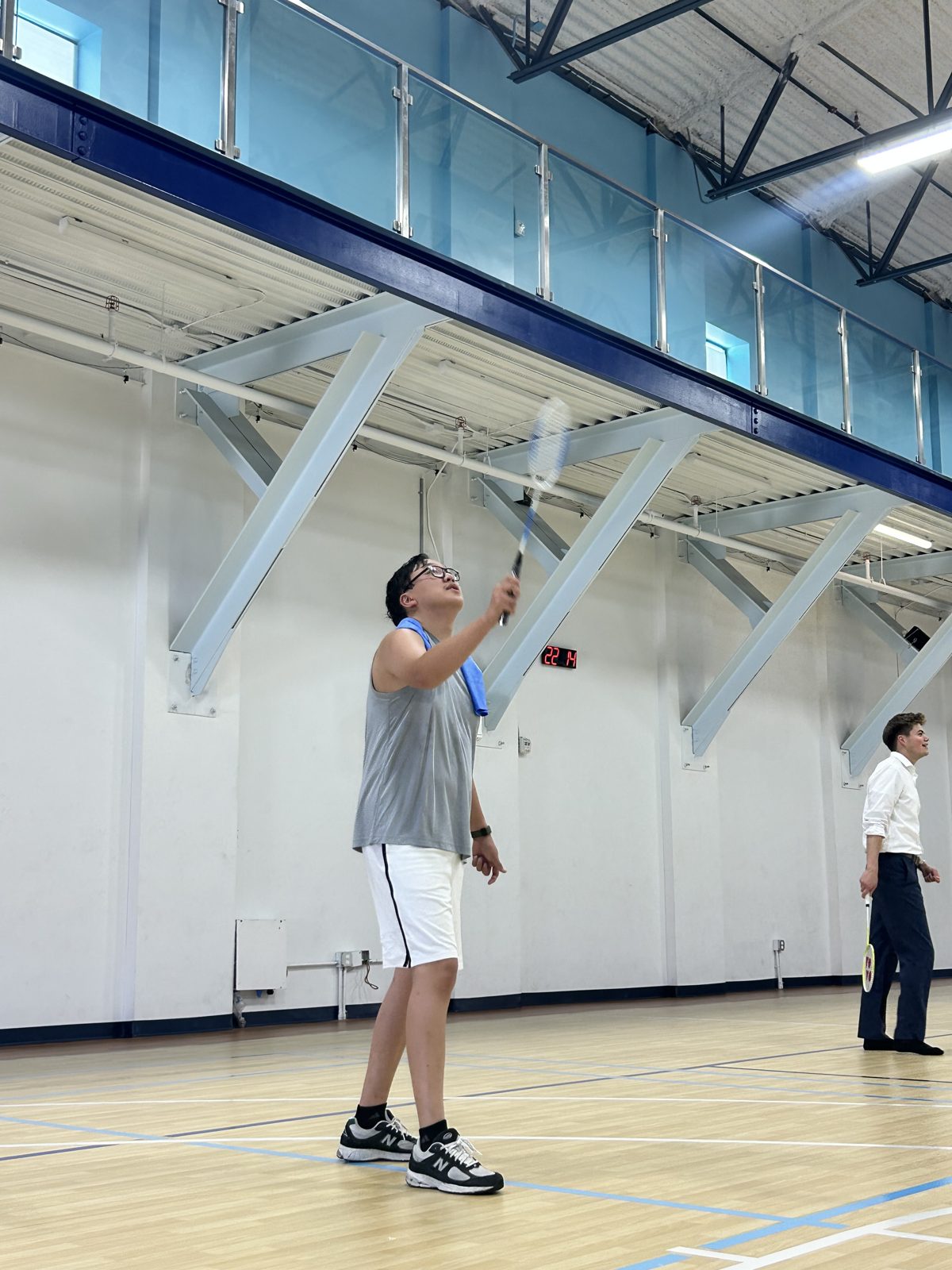 High badminton serve at the gym